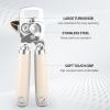 imageCan Opener Manual Heavy Duty Stainless Steel Smooth Edge Can Openers With Soft Touch Handle Oversized Handheld Easy Turn Knob MultiFunction Bottle Opener BlackBeige